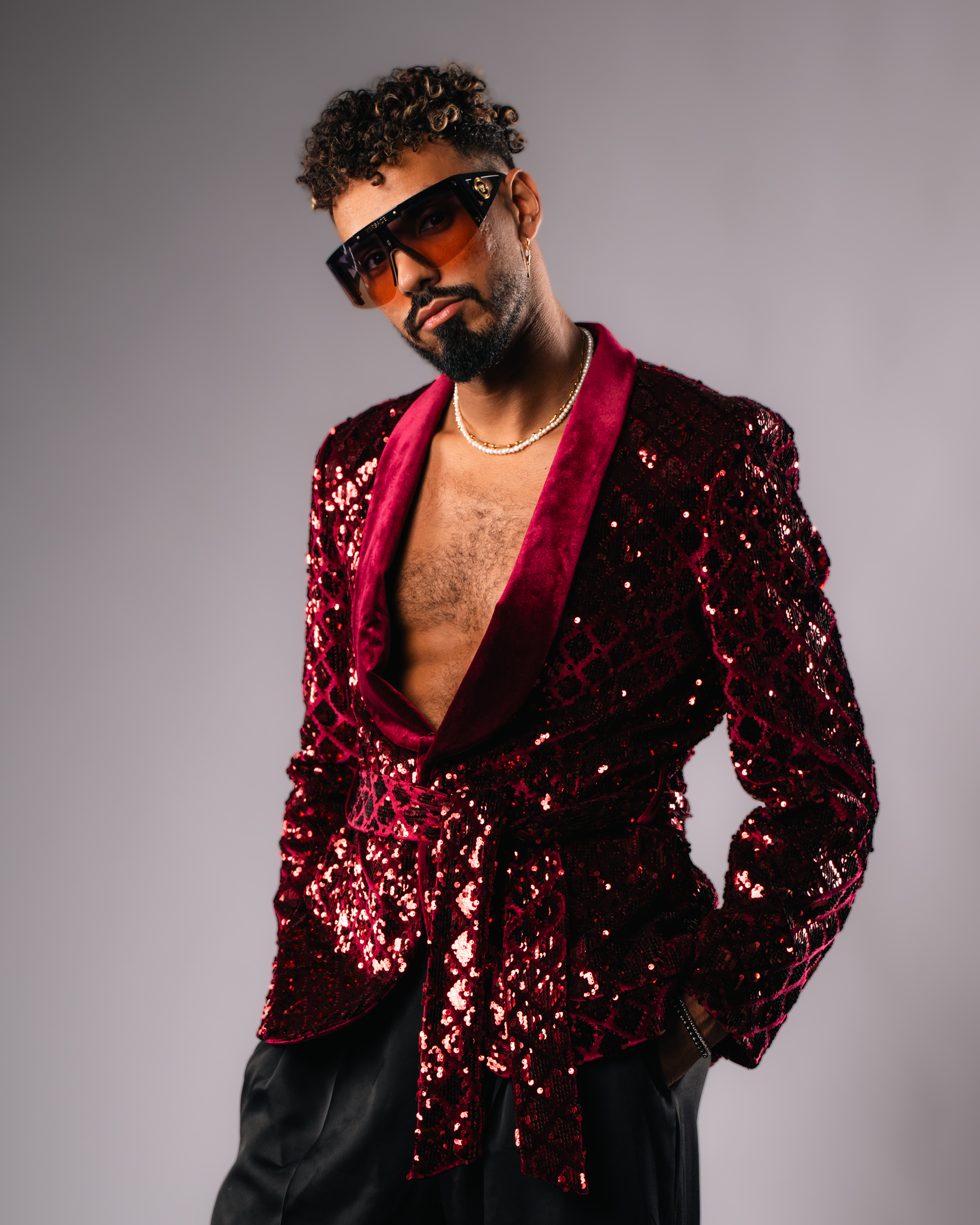 Blue digital watch on a dark liver background.