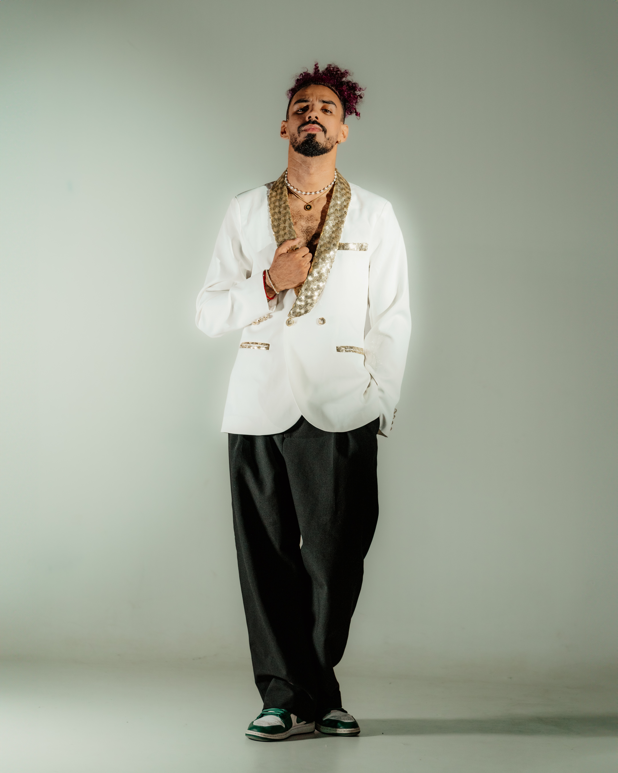 On a dark liver background, Airport luggage car carrying a luggage.