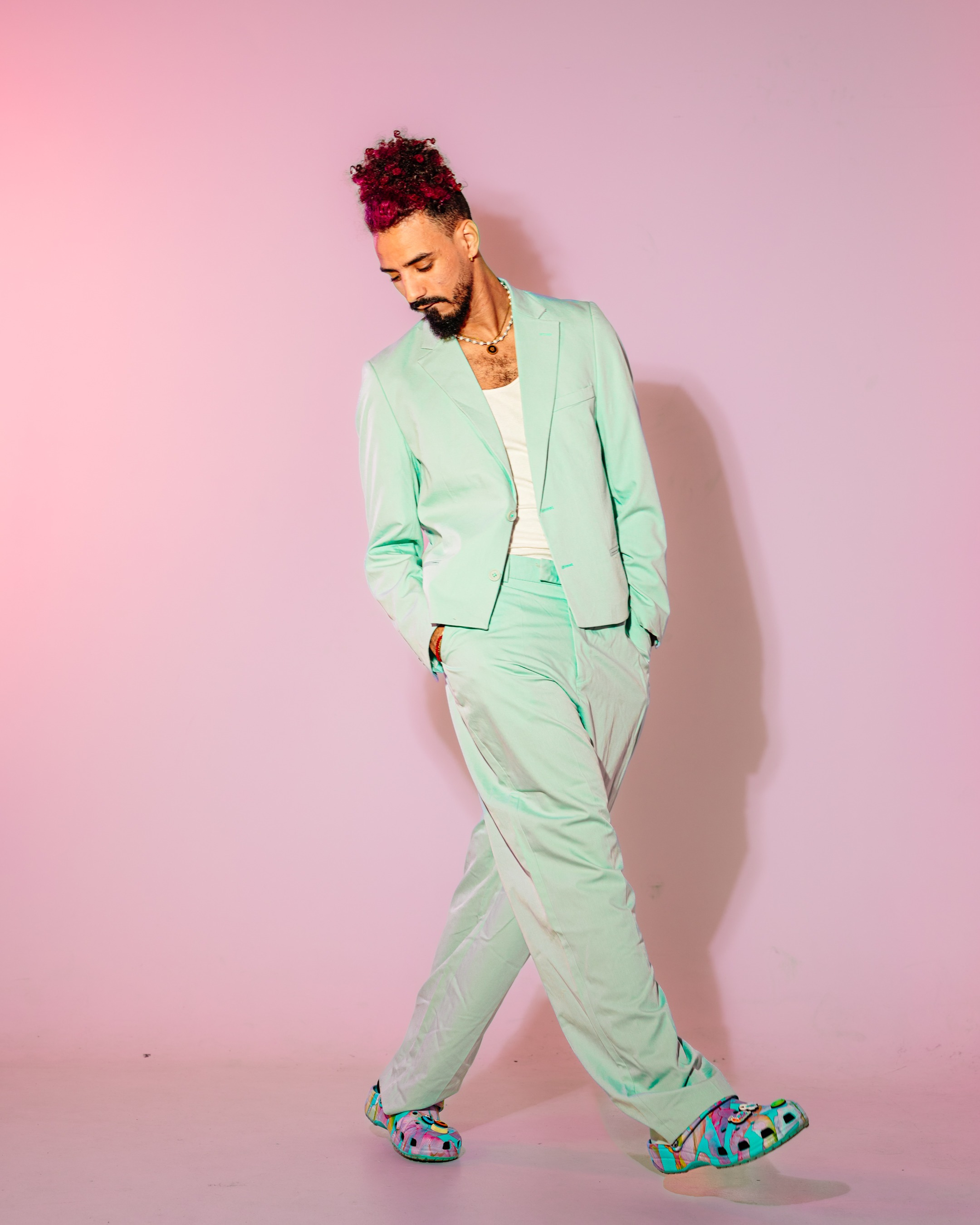 A macintosh on a yellow background.