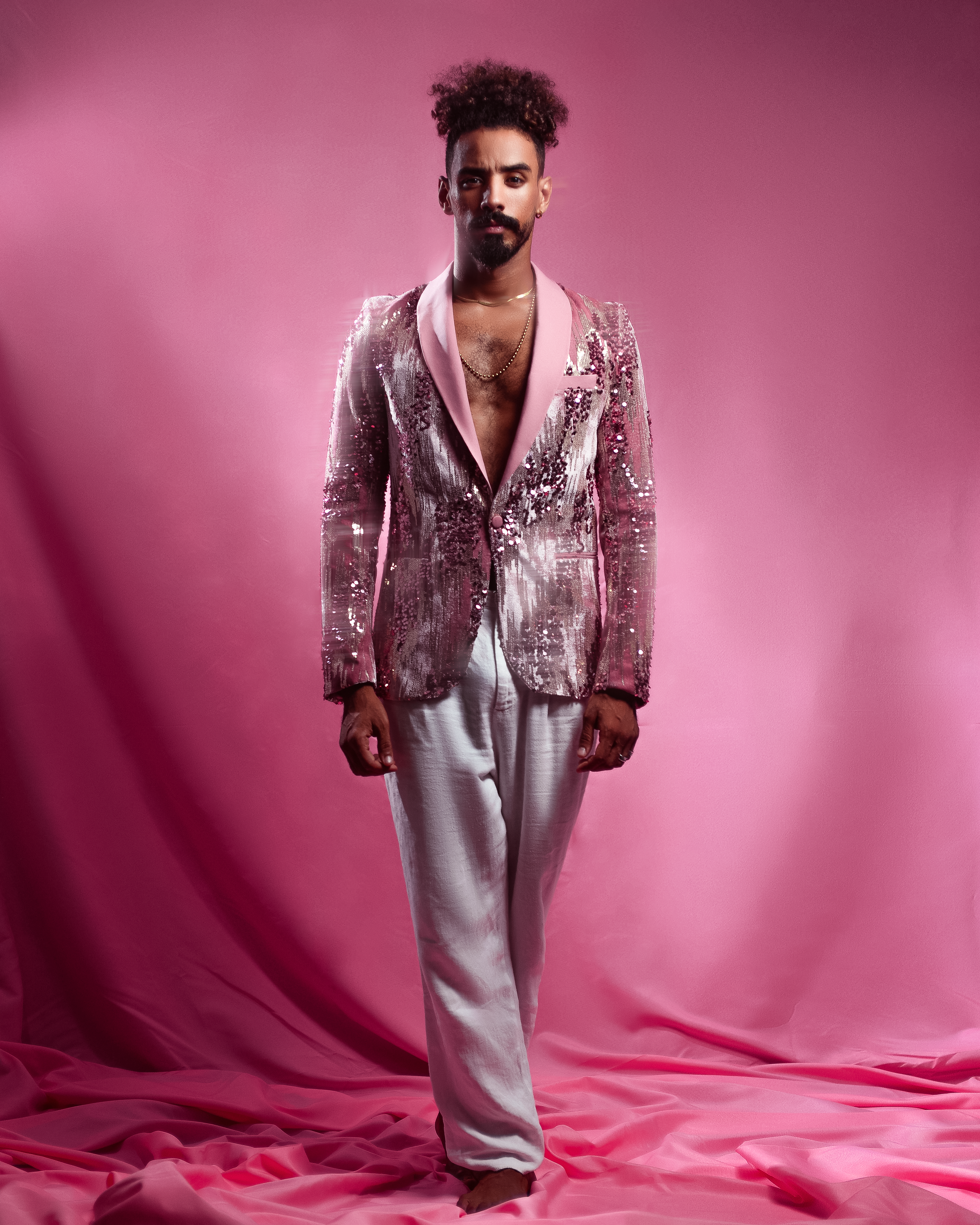 A fujifilm instant camera on a dark electric blue background.